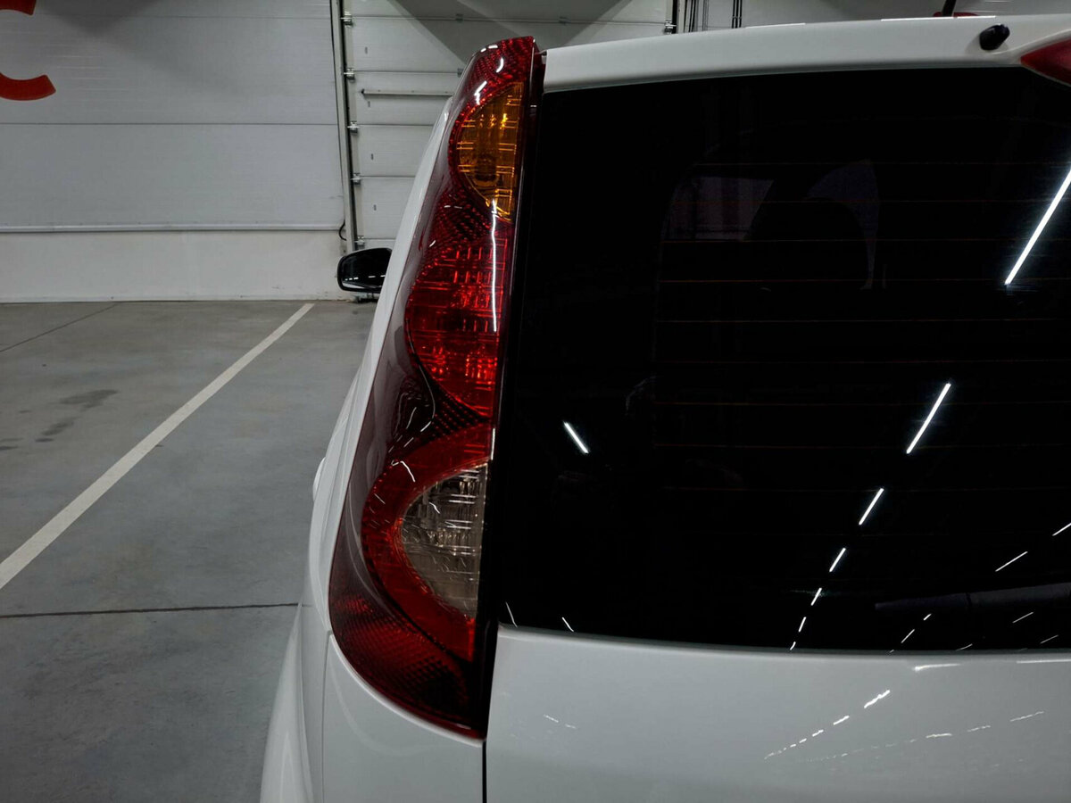 Nissan Note I Рестайлинг, 2012 Фото №9